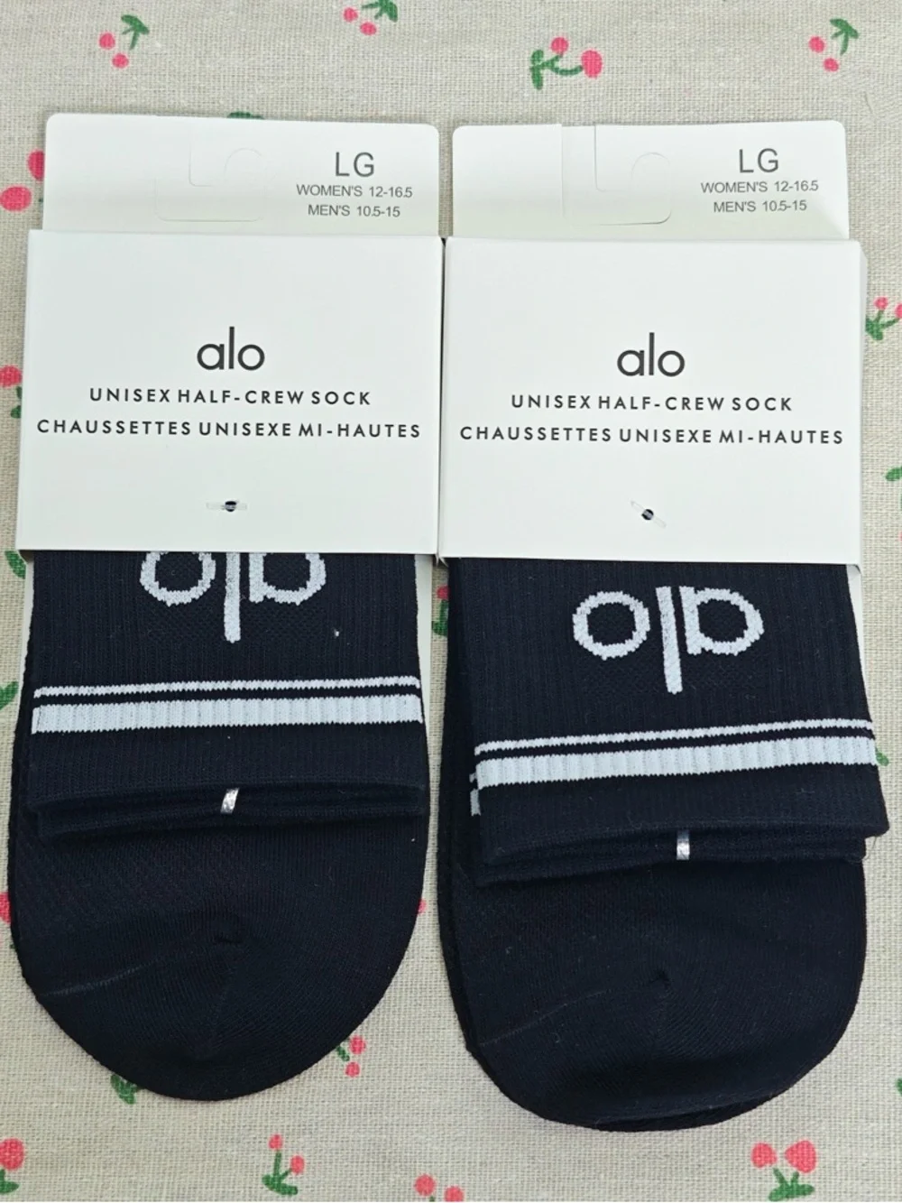 ALO Yoga Black Half-Crew Socks with White Stripes and Logo